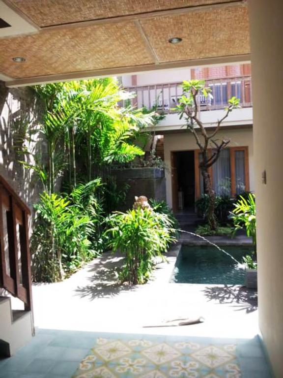 Jukung Guest House Санур Экстерьер фото