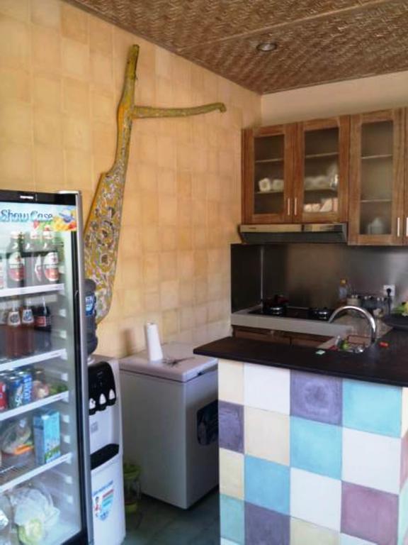Jukung Guest House Санур Экстерьер фото