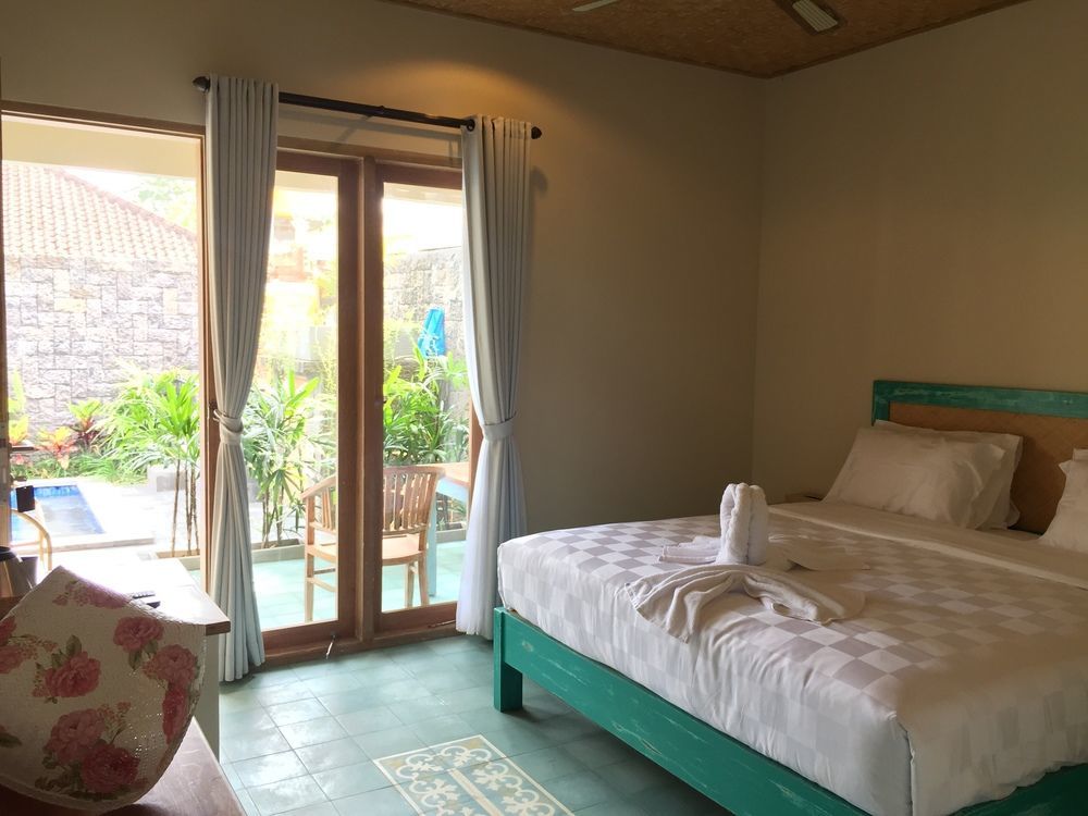 Jukung Guest House Санур Экстерьер фото
