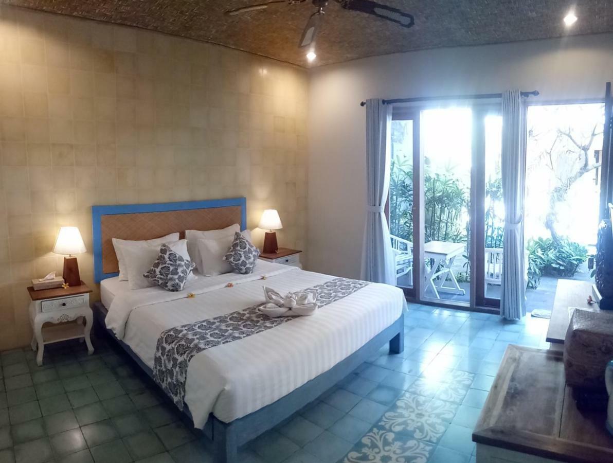 Jukung Guest House Санур Экстерьер фото