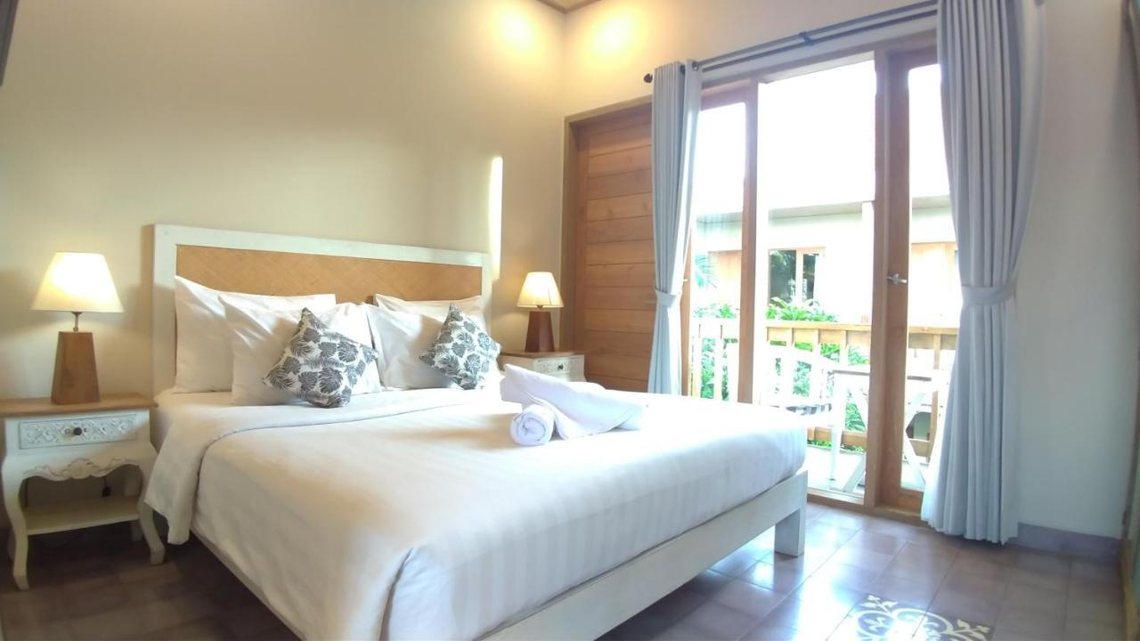 Jukung Guest House Санур Экстерьер фото