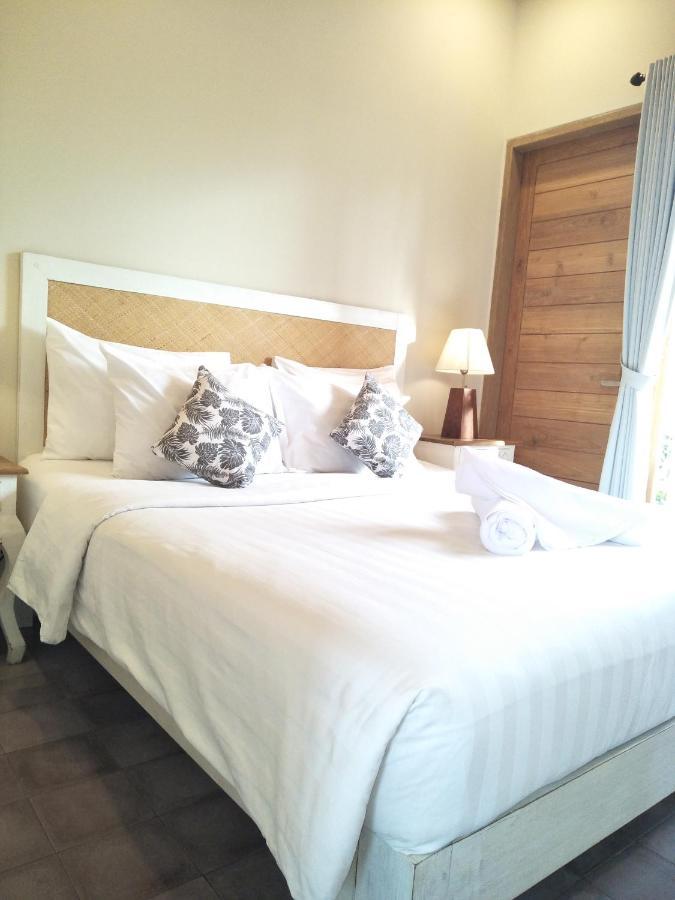 Jukung Guest House Санур Экстерьер фото