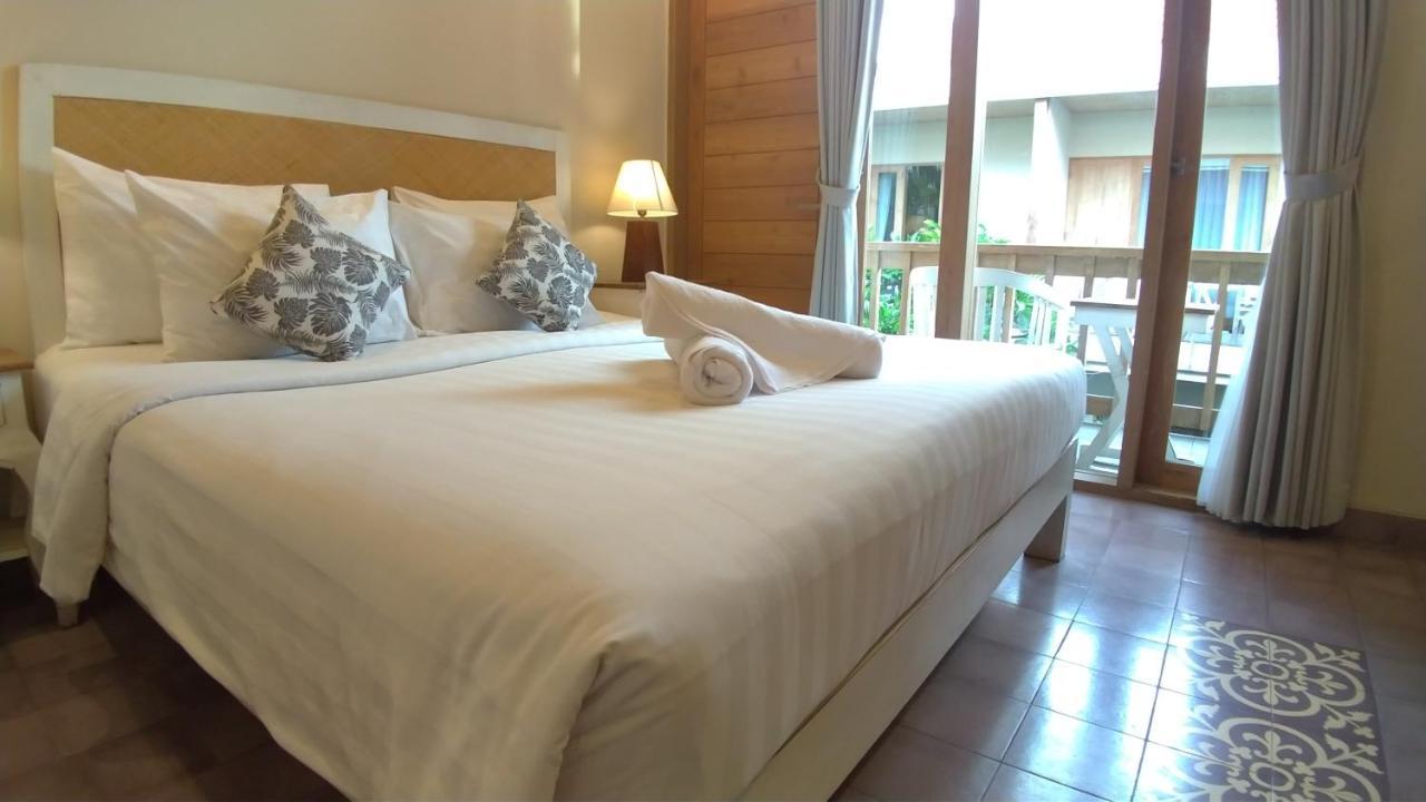 Jukung Guest House Санур Экстерьер фото